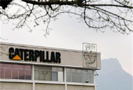 14 мая 2009 года на двух заводах Caterpillar в Гренобле и Эшироле во Франции начались увольнения 733 рабочих. Рабочих должны были сократить еще в феврале, однако акция протеста, во время которой были взяты в заложники менеджеры, отсрочила действия администрации.