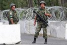 В центре киргизского города Ош на юге страны  установлены блокпосты, силовые структуры ведут круглосуточное дежурство в связи с появившимися слухами о готовящейся второй волне беспорядков.